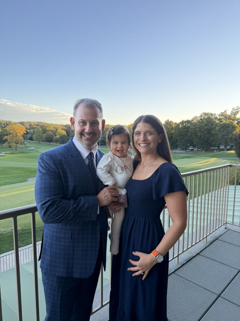 Alan Rhode with his wife Jamie and their daughter